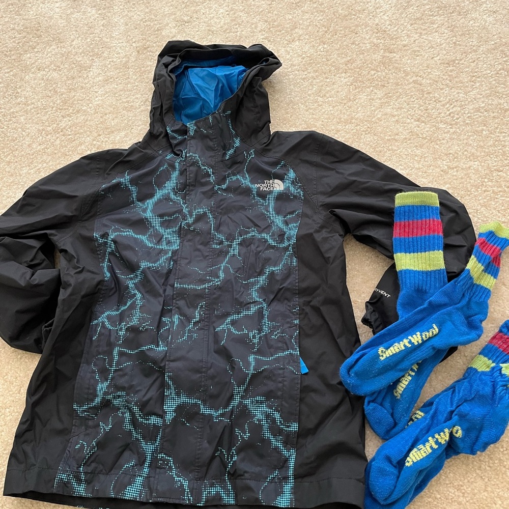 Boys north face rain jacket and smart wool socks